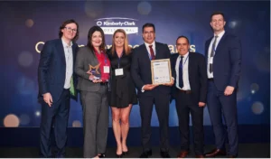 An image of the key enviro team accepting their awards at the Kimberley Clark Gold Service Awards